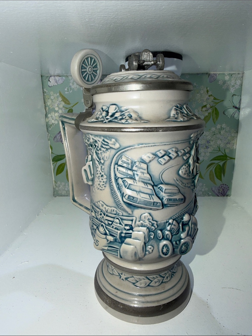 Avon Blue and Cream Ceramic Racing Relief Stein